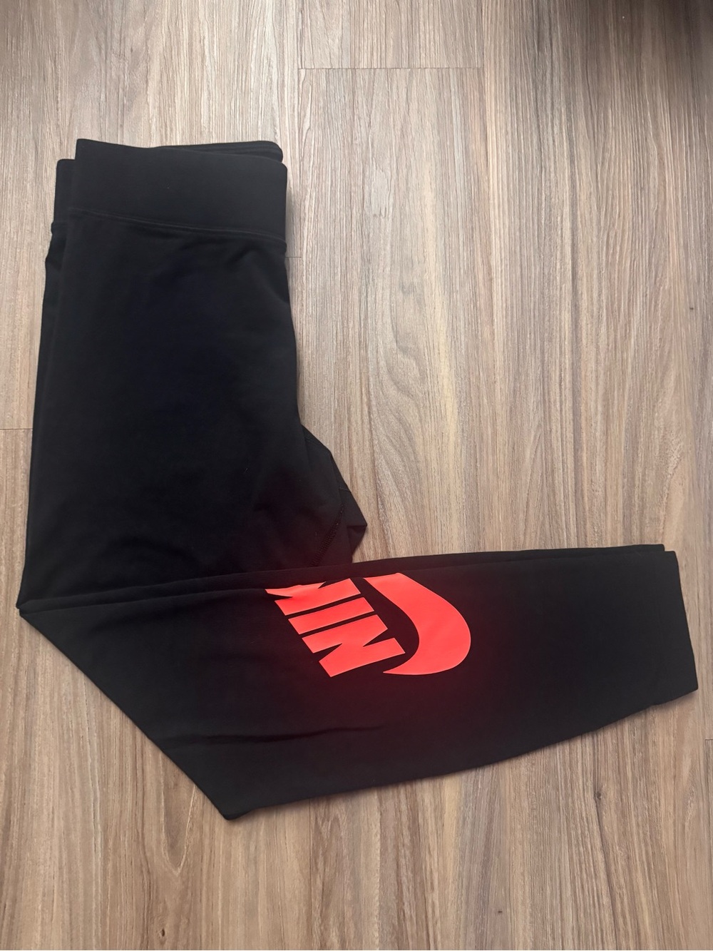 Nike women’s Black Leggings with coral Logo